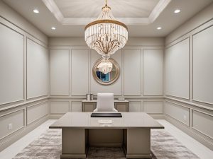 home office with large chandelier